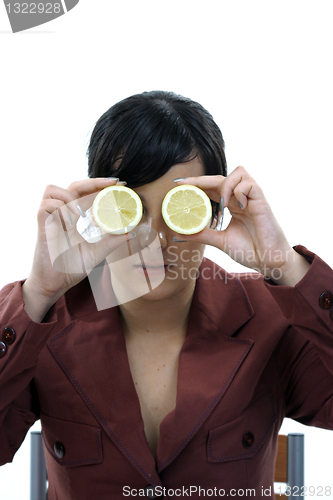 Image of beautiful woman with orange and lemon, healthy citrin photo