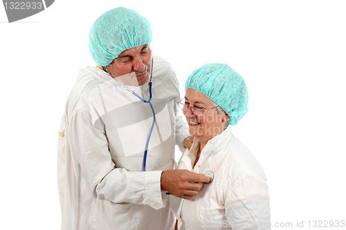 Image of mature doctor couple, team of doctors, healthcare photo