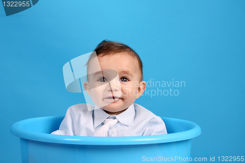 Image of Portrait of a happy baby boy Isolated on blue background
