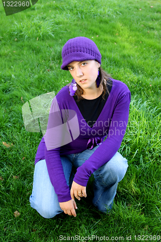 Image of  beautiful woman in an autumn park 