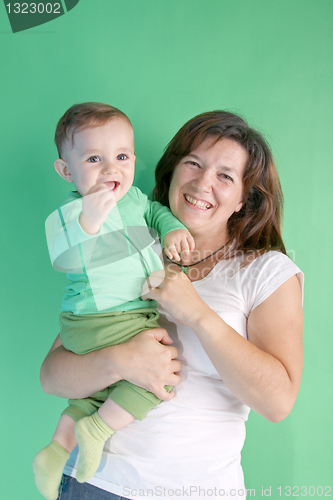 Image of beautiful baby with his aunt, studio shoot