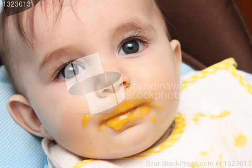 Image of beautiful child eating soup, food child photo