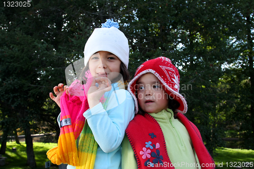 Image of Cute girl in autumn park