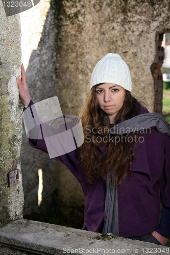 Image of  beautiful woman in an autumn park 