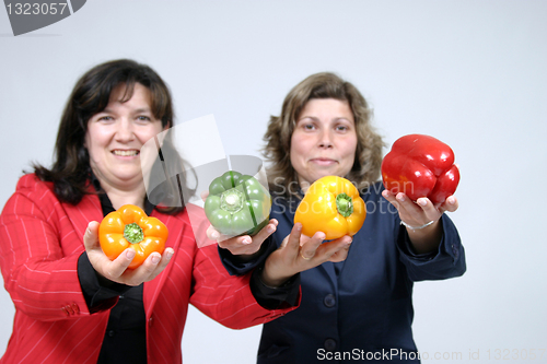 Image of woman with colored peppers, healthy food photo