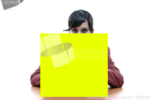 Image of Young woman holding blank board