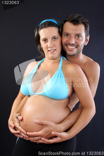 Image of beautiful and happy & young pregnant couple 