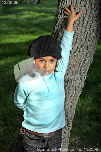 Image of Cute girl in autumn park