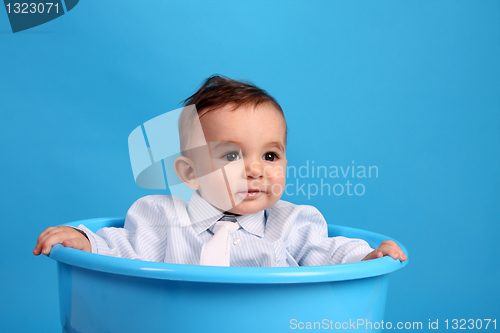 Image of Portrait of a happy baby boy Isolated on blue background