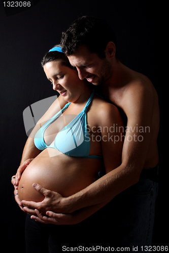 Image of beautiful and happy & young pregnant couple 