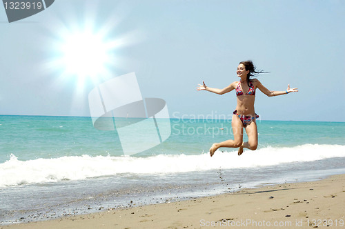 Image of Beautiful girl on a beach