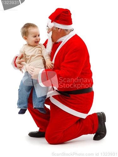 Image of Santa Claus and little boy together