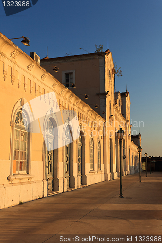 Image of Old boats and train station.