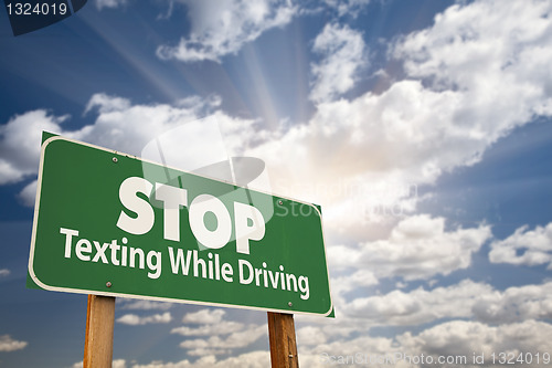 Image of Stop Texting While Driving Green Road Sign