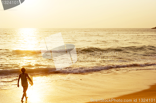 Image of Surfer on the beach