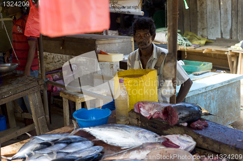 Image of Seller at a fish  market