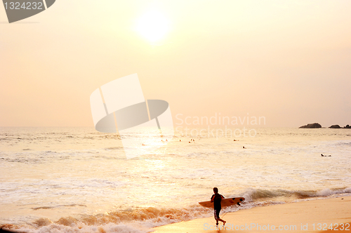 Image of Surfer on the beach