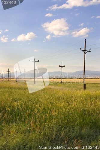 Image of Field in Helena with Clouds and Blue Skies