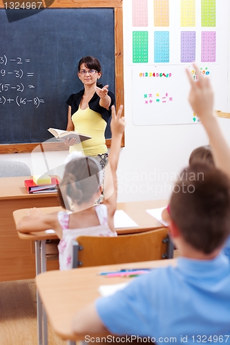 Image of Teacher pointing at students