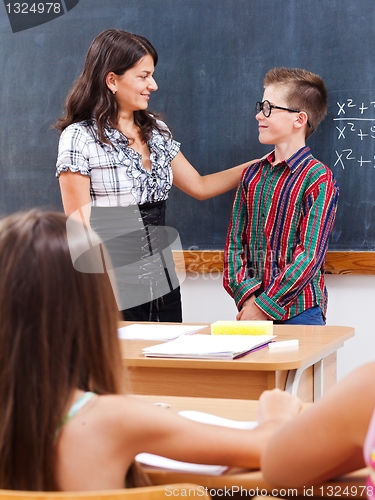 Image of Eminent boy at chalkboard