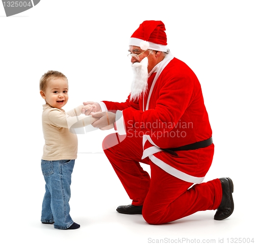 Image of Santa Claus and little boy together