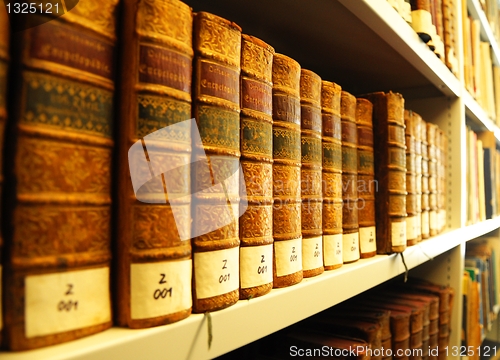 Image of old books in library