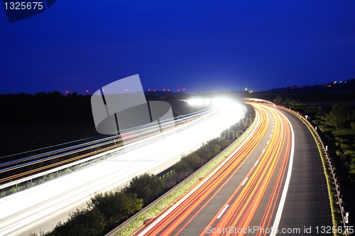 Image of night traffic on highway