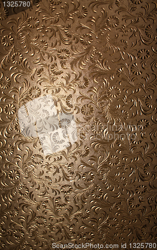 Image of Brown Glass with Floral Pattern