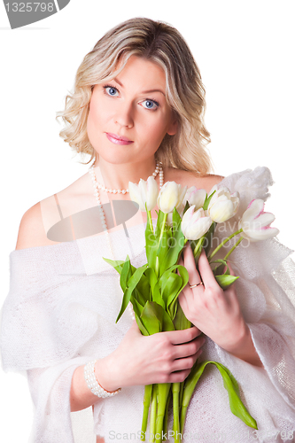 Image of blonde woman with bouquet of tulips