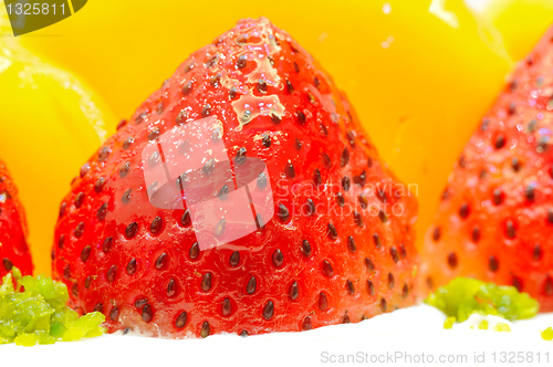 Image of Strawberry and mango on the cake