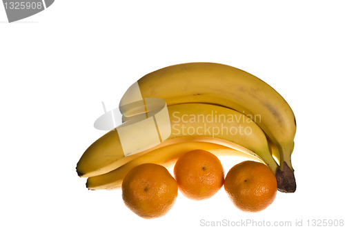 Image of Ripe bananas and oranges