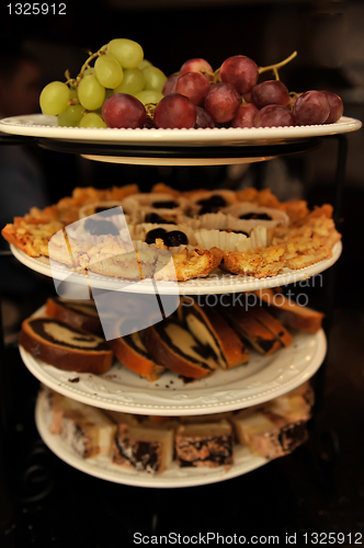 Image of Grapes and various cakes