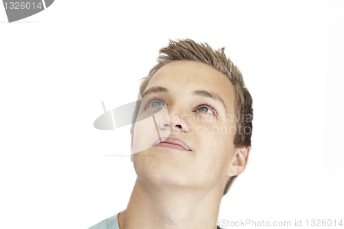 Image of daydreaming young man