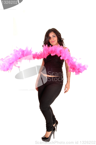 Image of Teenager with pink feathers.