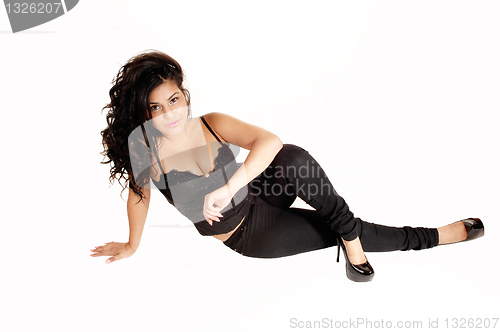 Image of Girl sitting on floor.