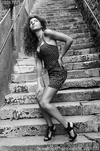 Image of Attractive woman in a staircase