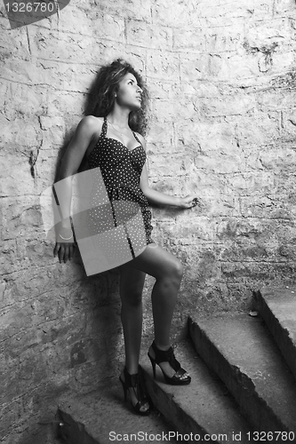 Image of Woman in a staircase