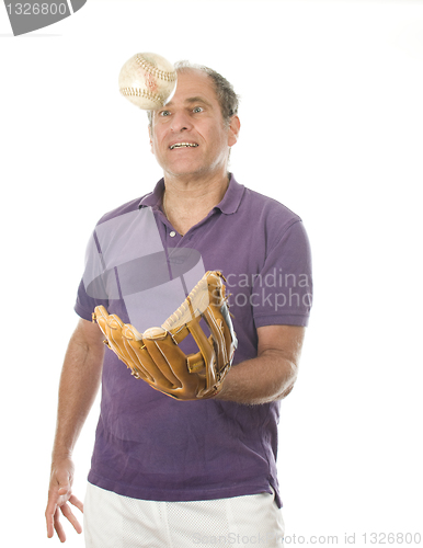 Image of man softball and baseball glove