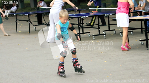 Image of boy on roller skates