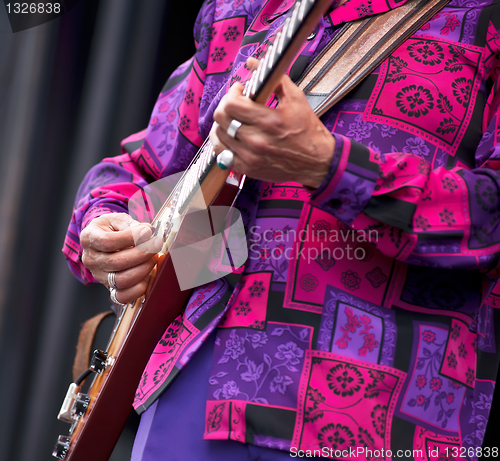 Image of Jazz festival man playing guitar