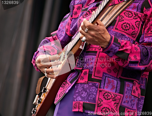 Image of Jazz festival man playing guitar