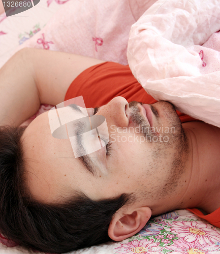 Image of Portrait of a young man sleeping.