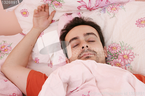 Image of Portrait of a young man sleeping.