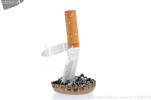 Image of Cigarette butt and ash in a bottle cap