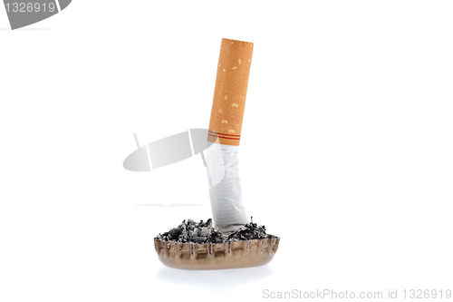 Image of Cigarette butt and ash in a bottle cap