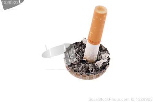 Image of Cigarette butt and ash in a bottle cap