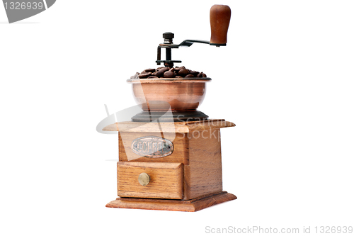 Image of Coffee grinder and coffee beans