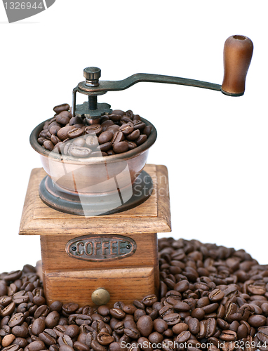 Image of Coffee grinder and coffee beans