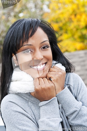 Image of Portrait of young woman outdoors