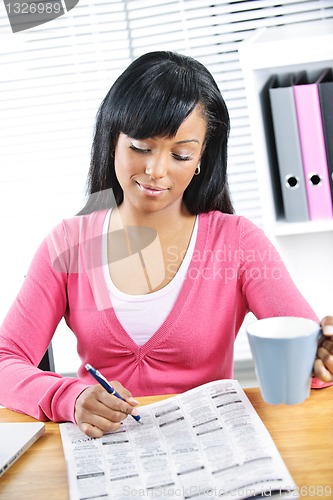 Image of Young woman looking for job